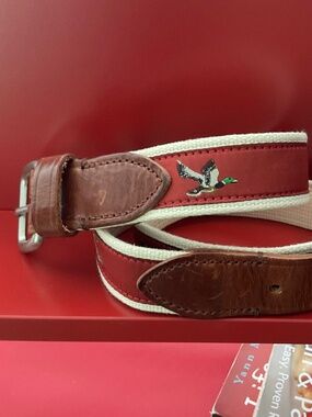 Belt J. Crew vintage canvas & leather goose belt, 32’ my guess size is XS-S